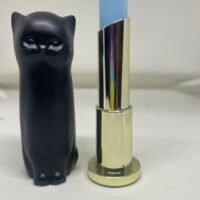 balsam de buze în formă depisică (aromă de piersici)